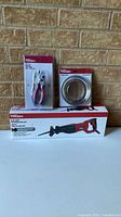 Boxed Hyper Tough reciprocating saw with packaged pliers set and magnetic bowl