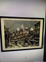 Framed print showing Sacré-Cœur winter street scene