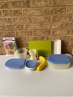 all items grouped on table against brick wall