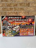 Front of boxed Tyco Transformers Electric Train & Battle Set