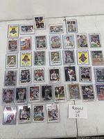 Overview of all cards laid out in top-loaders