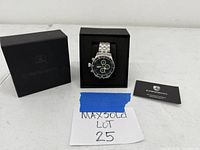 Watch and box with manual and tag displayed