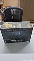 Box of Dark Souls The Board Game Gaping Dragon Expansion shown standing vertically with artwork visible.
