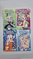 Front covers of four Magical x Miracle manga books, volumes 3,4,5,6 with illustrated anime-style female characters in colorful outfits