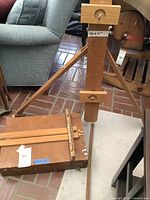 Full view of wooden easel showing adjustable wooden frame with labelled 40x4 inch dimensions