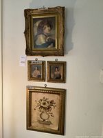 Four framed art prints hanging on wall: top 16x13 portrait of young woman with dog, middle two 8x6 portraits of women, bottom 17x14 floral print