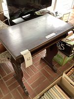 Wooden desk seen from above showing the flat surface and the overall dimension and condition.