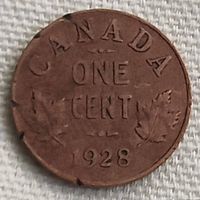 Reverse side of a 1928 Canadian one cent coin showing 'CANADA', 'ONE CENT', dual maple leaves, and the year 1928.