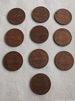 Photo of all 10 pennies showing the reverse side with Lincoln Memorial design.