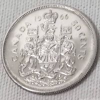 Reverse of the coin showing the Canadian Coat of Arms, year 1966 and denomination 50 cents.