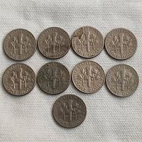 Photo shows reverse sides of nine Roosevelt dimes, with torch, olive branch, oak branch design and text UNITED STATES OF AMERICA and ONE DIME.