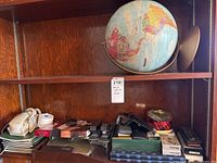 Overview of lot on wooden shelf