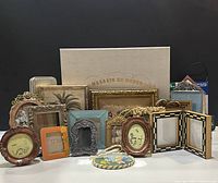 Full view of assorted mini photo frames and decorative items showing variety of styles, shapes and colors.