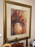 Front view of framed floral print showing detailed artwork of flowers in vase.