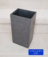 Full view of large rectangular slate vessel showing front and side with clean design, natural grain, and smooth finish. Item placed on light carpeted stairs.