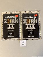 Two unopened Zork II and Zork III packages laid flat, front view
