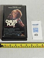 Front of Child's Play VHS case showing image of Chucky and title