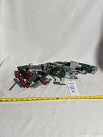 Loose LEGO bricks and parts from Slave 1 set showing missing bricks condition