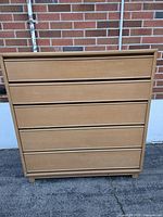 Front view of the Kroehler vintage dresser showing five horizontal drawers and overall light wood finish.