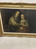 Close-up of painting showing the portrait subject and canvas texture