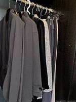 Overview of all hanging jackets and pants