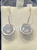 Close-up photo of pair of Swarovski crystal earrings set in .925 silver.