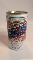 Photo of unopened Billy Beer can front and sides showing branding and signature