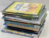 Stack of 20 like-new children's books showing spines and thicknesses.