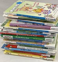 Stacked view of 20 children's books showing titles and condition