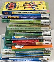 Stack showing variety of titles and publishers including Galaxy Zack, Magic Tree House, MVP, and Berenstain Bears among others