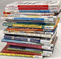 Stack of 20 children's books showing titles and authors.