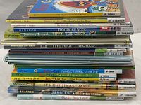 Top view of stacked children's books showing spines with titles and authors, featuring 20 like-new books by various authors including JP Dean, Gianferari, Shannon.
