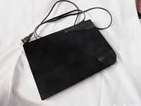 Top view of Samsung Blu-ray player showing black glossy surface and round control dial