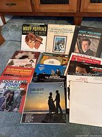 Full view of the collection of vintage vinyl LP record albums including Mary Poppins, Mormon Tabernacle Choir, Andy Williams, Ray Charles, Sonny & Cher, The Fifth Dimension, The Princeton Trio, and Earl Grant albums.