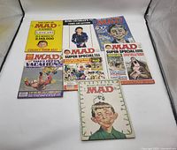 Eight MAD Magazine issues arranged in two rows showing front covers clearly.