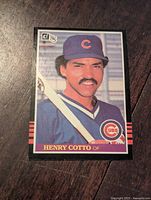 Front photo of the Henry Cotto baseball card showing player image and details