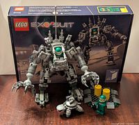 LEGO ExoSuit 21109 set with box, ExoSuit figure, two minifigures, drone, and platform.