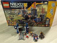 Photo showing the original LEGO Nexo Knights 70317 box with the partially built King's Mech and minifigures displayed in front.