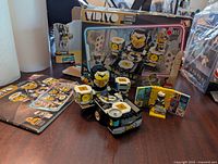 Photo of LEGO Vidiyo Music Video Maker assembled set including robot figure, vehicle, and minifigures displayed alongside instruction manual on table.
