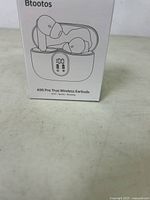 Box front showing image and label Btootos A90 Pro True Wireless Earbuds noting Bluetooth 5.0, Sports & Running features, digital display on charging case.