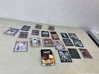 Overview of the lot showing assorted collectible cards from various card games and hockey cards, some loose and others in sleeves.