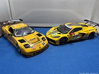 Front three-quarter view of both Corvette models