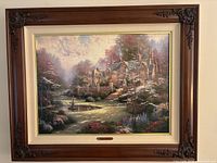 Full front view of the framed artwork showing frame, matting, and print