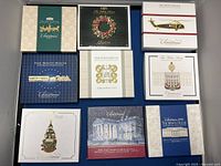 View of nine White House Historical Association Christmas ornament boxes arranged in a grid.