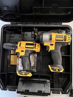 Open carrying case showing DCF815 impact driver and DCD710 drill/driver