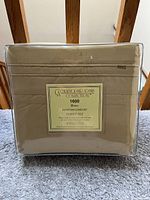 Front view of golden king size sheet set packaging showing brand and product details