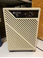 Front view of Mastercraft D28 dehumidifier showing vents, control panel, and control knob.