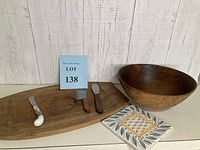 Full lot showing wooden tray, wooden bowl, ceramic tile, two spreaders, and small cleaver.