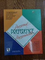 Top view of sealed Personal Preference board game box, showing front with multicolor geometric design and text.