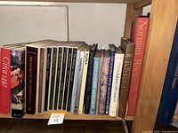 Books shelved showing titles including Circa 1492, Treasures of the Smithsonian, and Native American Heritage titles.